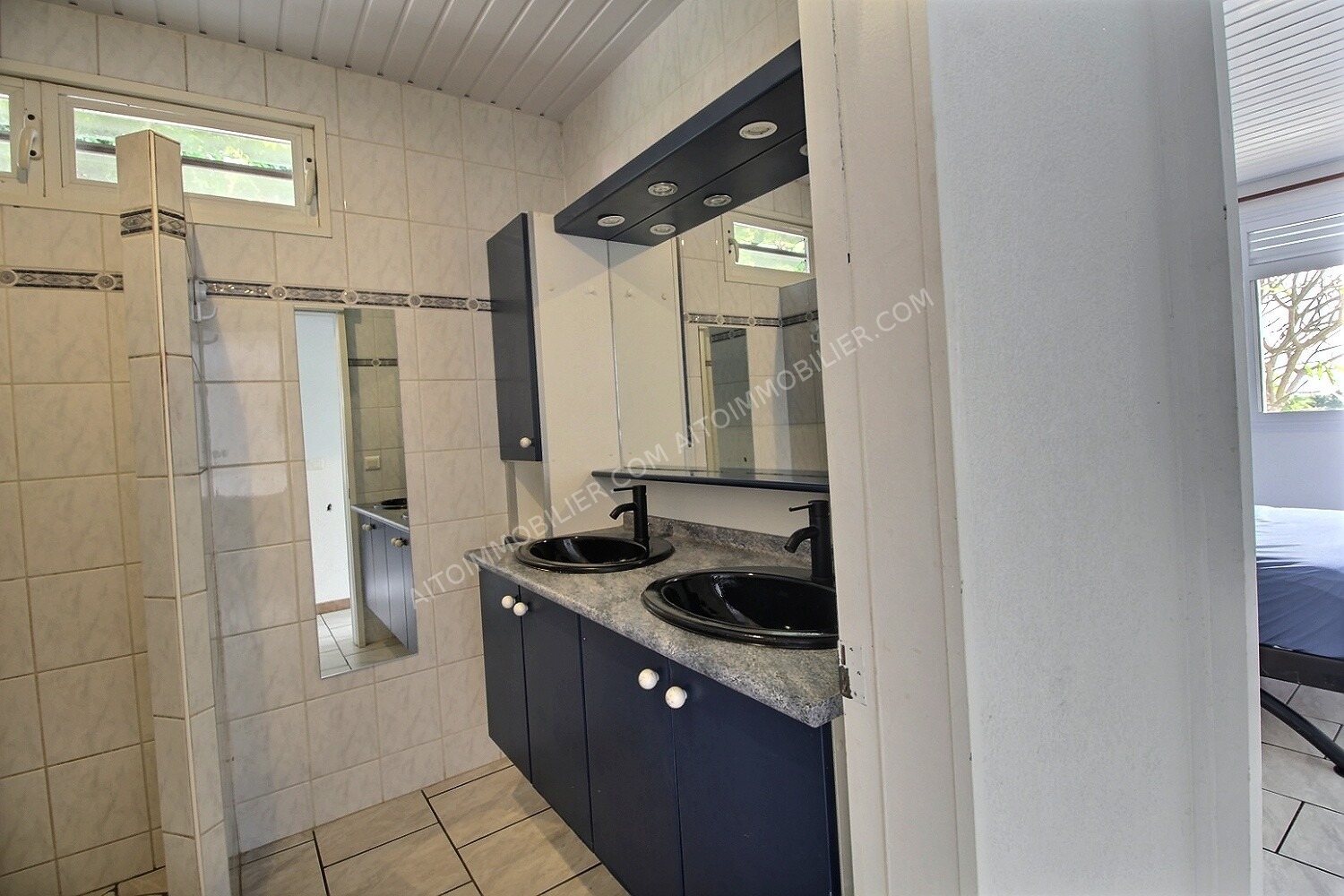 A LOUER BAS DE MAISON F5 PUNAAUIA 9
