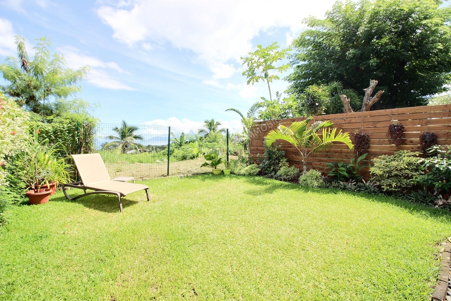 PUNAAUIA ROYAL PALM'S F2 REZ-DE-JARDIN AVEC TERRASSE ET JARDIN PRIVATIF 5